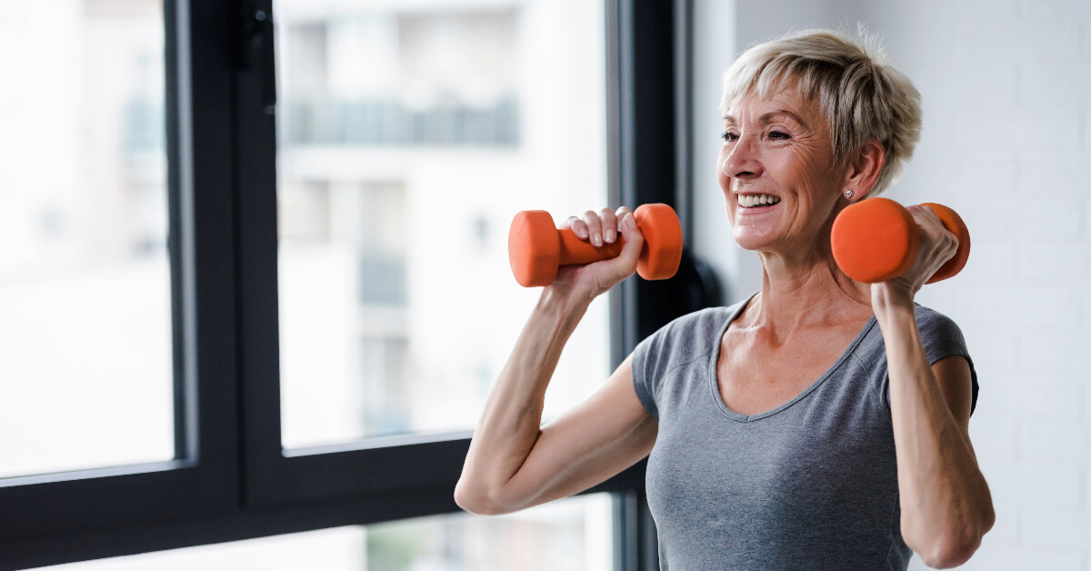 senior woman exercising with hand weights