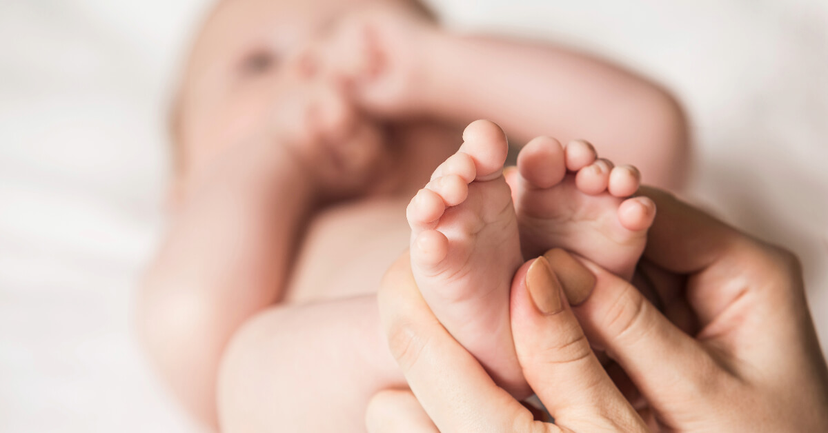 touching baby's feet